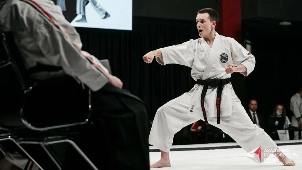 Тейк ван до боевое искусство. Тхэквондо фотосток. Боксер на черном фоне. Боксер на темном фоне. Тони джа 2020.