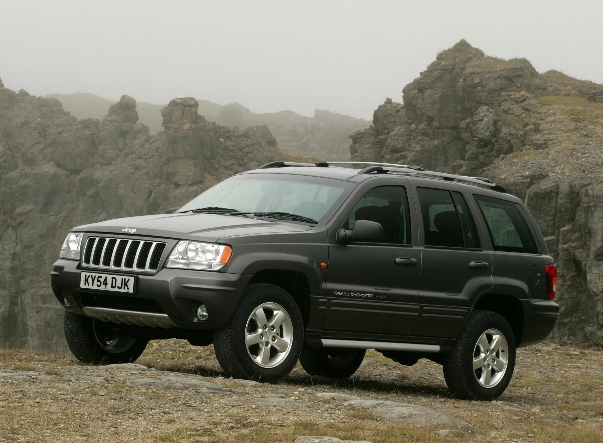Джип гранд чероки wj купить. Jeep Grand Cherokee 2003. Jeep Grand Cherokee WJ 2004. Jeep Grand Cherokee 1998-2004. Jeep Grand Cherokee WJ 1999.