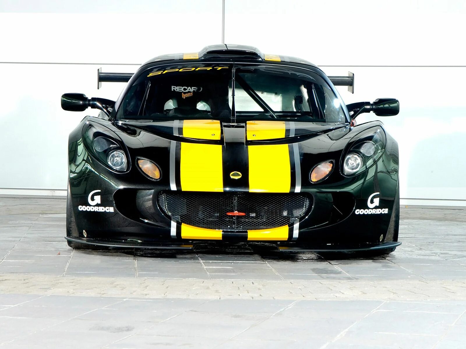 Polices car sport car. • Lotus Sport exige gt3. Lotus exige r-gt 2012. Лотус Эксидж 2021. Лотус автомобиль exige r-gt.