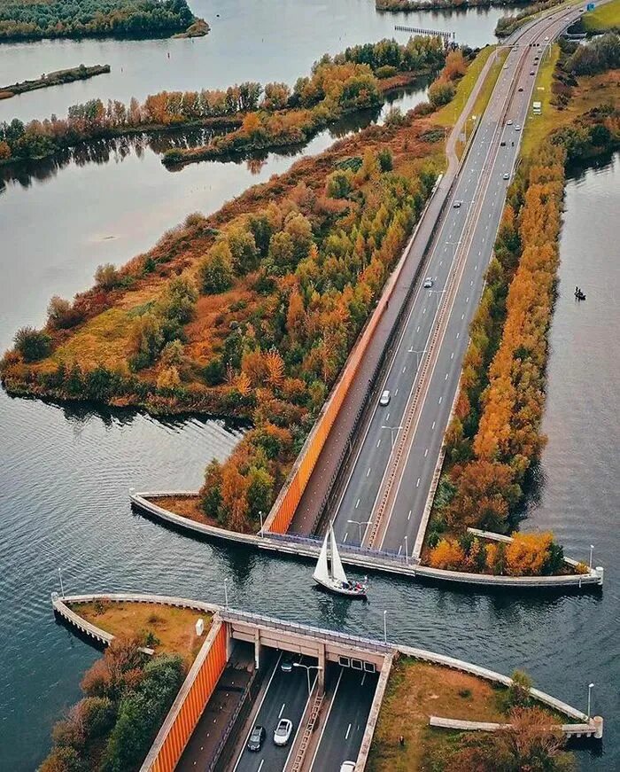 Мост голландии. Мост голландии. Акведук велувемеер нидерланды. Водный мост в биддингхёйзене нидерланды. Veluwemeer aqueduct мост водный.