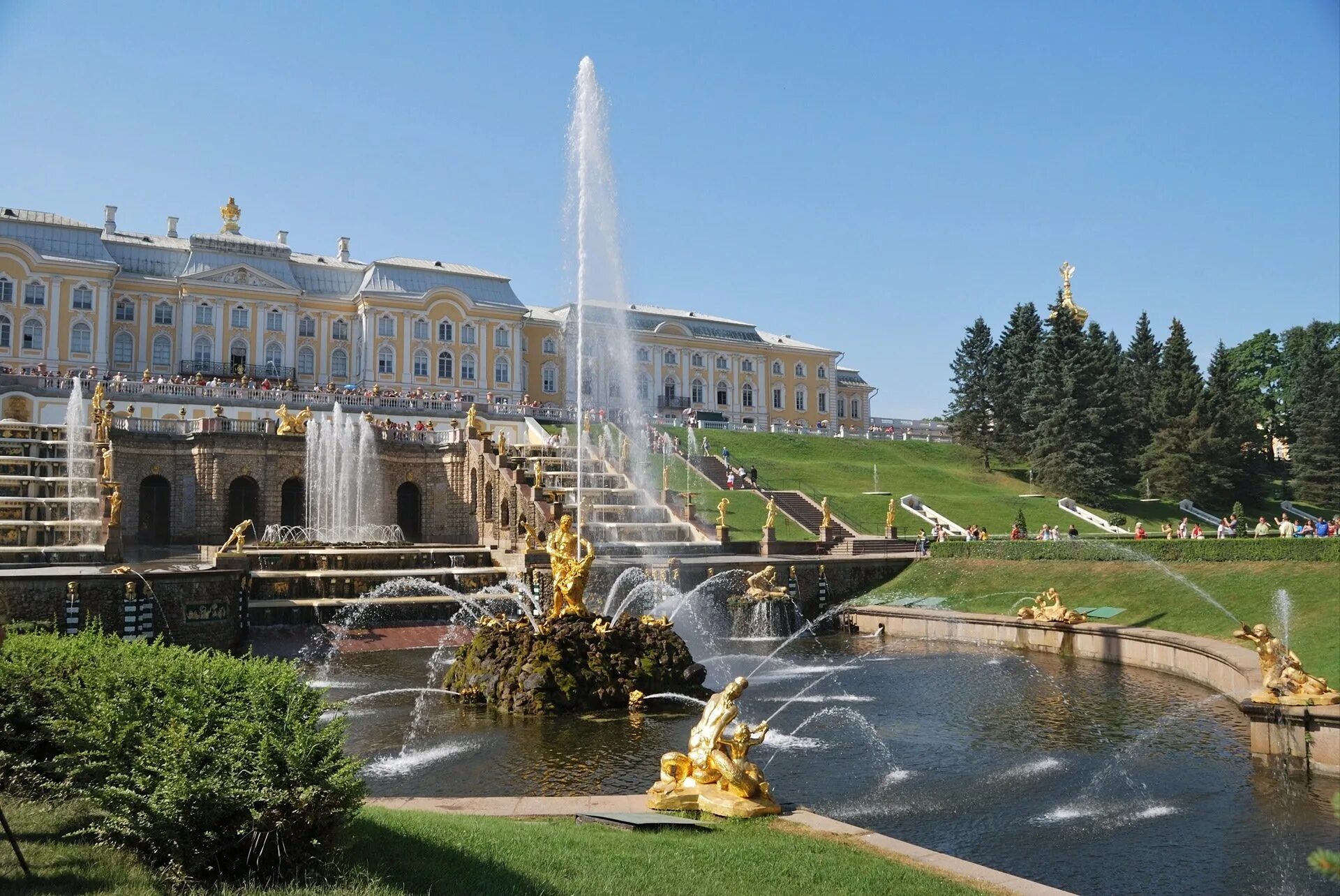 Окрестность санкт петербурга фото. Петергоф (дворцово-парковый ансамбль). Жворцовопарковый ансамбль Петергоф. Дрорцово-парковый ансамбль «Петергоф».. Петродворец большой дворец Каскад.