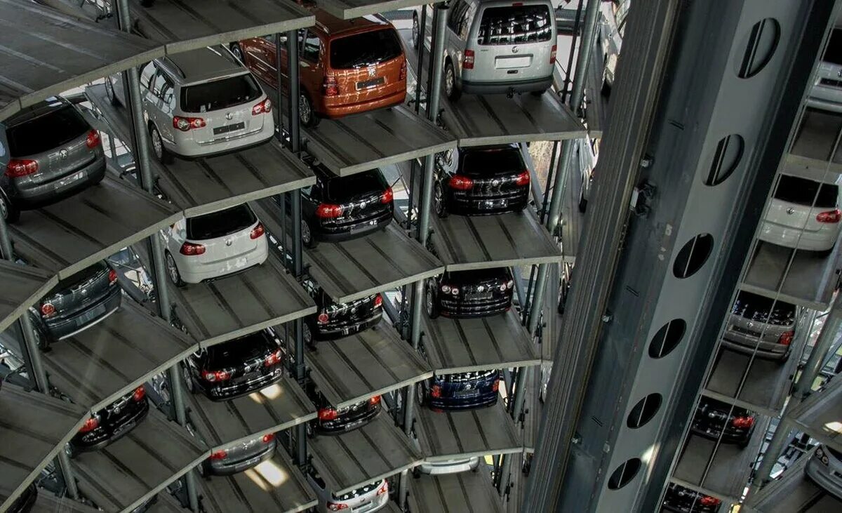Паркинг что это. Автоматическая многоуровневая парковка. Многоуровневые механизированные парковки. Многоярусная автоматическая парковка. Многоярусный автоматический паркинг.