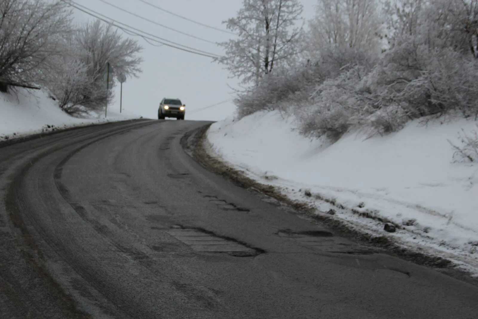 Дорога в Затоне Саратов. Саратов дороги зимой. Возвышение дороги. Вираж на дороге.