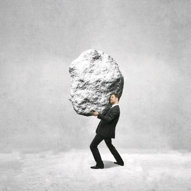 человек несет камень. человек тащит груз. человек несет тяжести. человек несет тяжести. человек несущий камни.