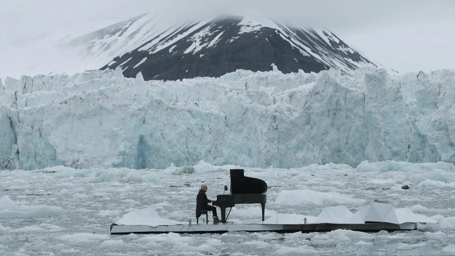 He often plays the piano. Людовико Эйнауди Арктика. Эйнауди Арктическая Элегия. Людовико Эйнауди Элегия для Арктики. Людовико Эйнауди на айсберге.