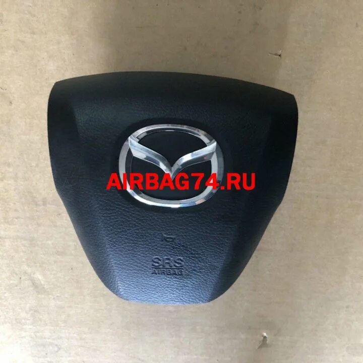 Подушка безопасности мазда 3. Аирбег Мазда 3. Подушка безопасности руля Mazda 6. Панель аирбэга на руль Мазда 3. Подушка безопасности znak Mazda 3.