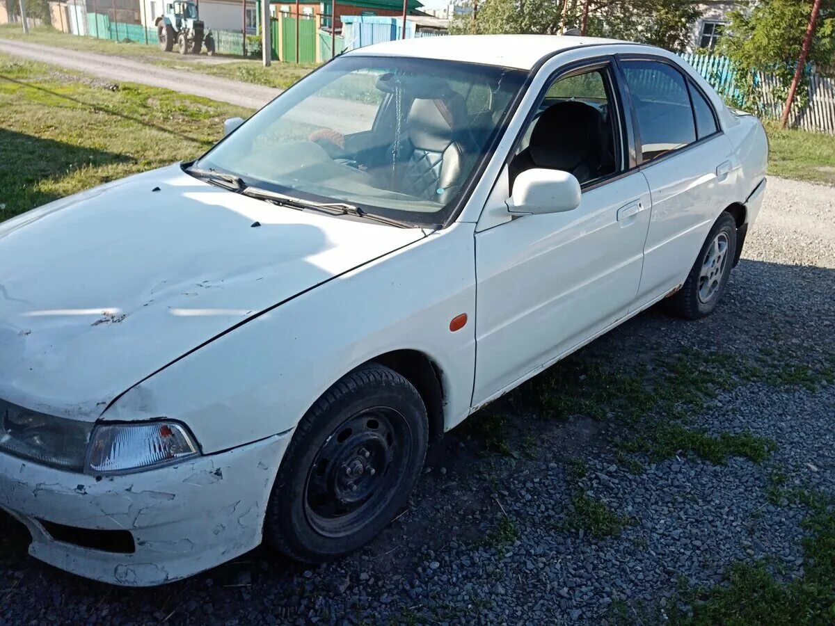 Митсубиси мираж купить. Mitsubishi Mirage 1998. Mitsubishi Mirage v 1998. Митсубиси Мираж 1998 седан. Mitsubishi Mirage 1998 купе.