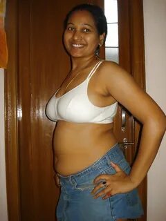 Slideshow gorgeous mallu aunty shows off her perfect pair of boobs in a stu...