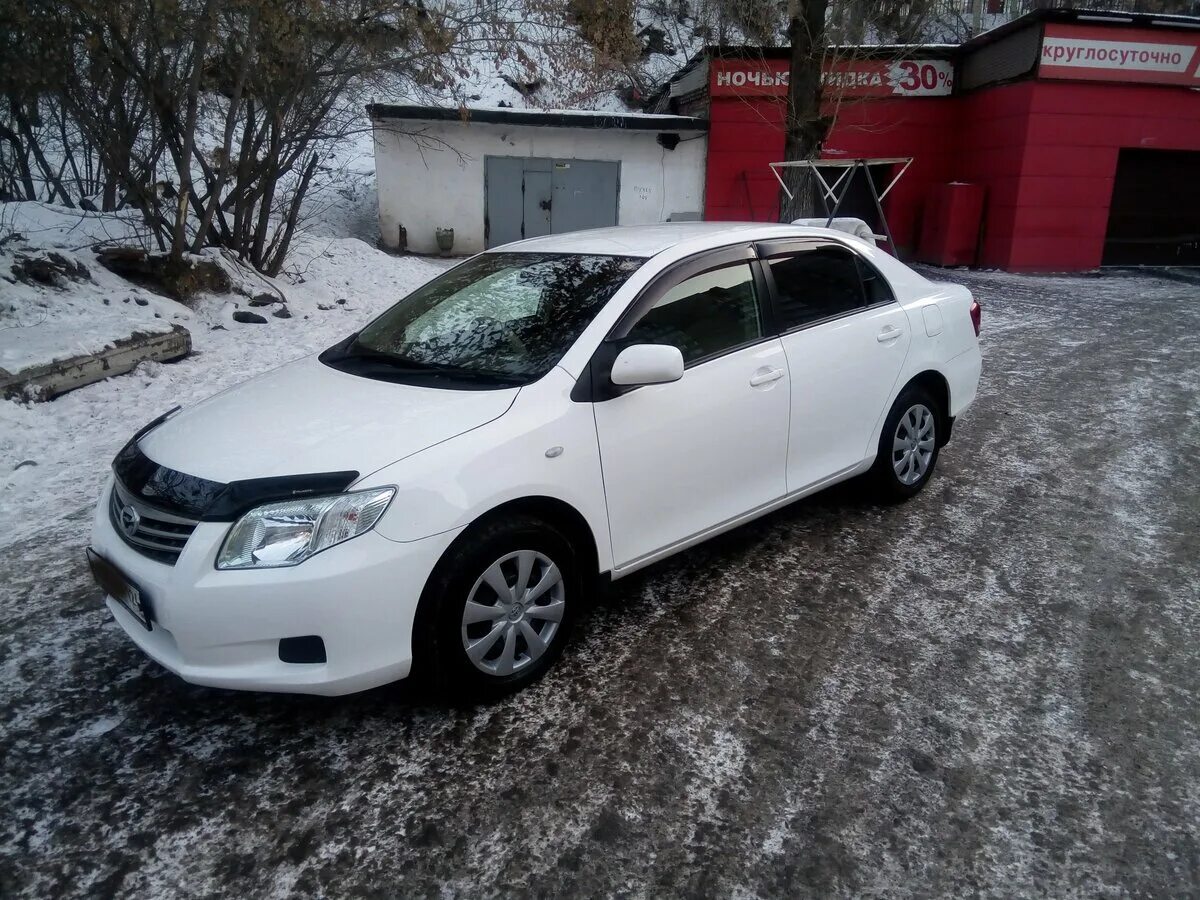 Продаже тойота аксио. Toyota Corolla Axio 2010. Тойота Королла Аксио 2010. Тойота Аксио 2008 белая. Тойота Королла 2010 белая.