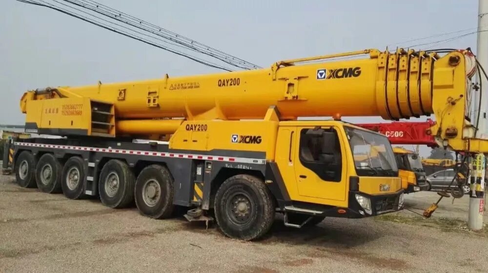 Автокран xcmg qay200. XCMG Truck Crane. For XCMG qay 200. XCMG qay200 тонн. XCMG qay200 грузоподъемность.