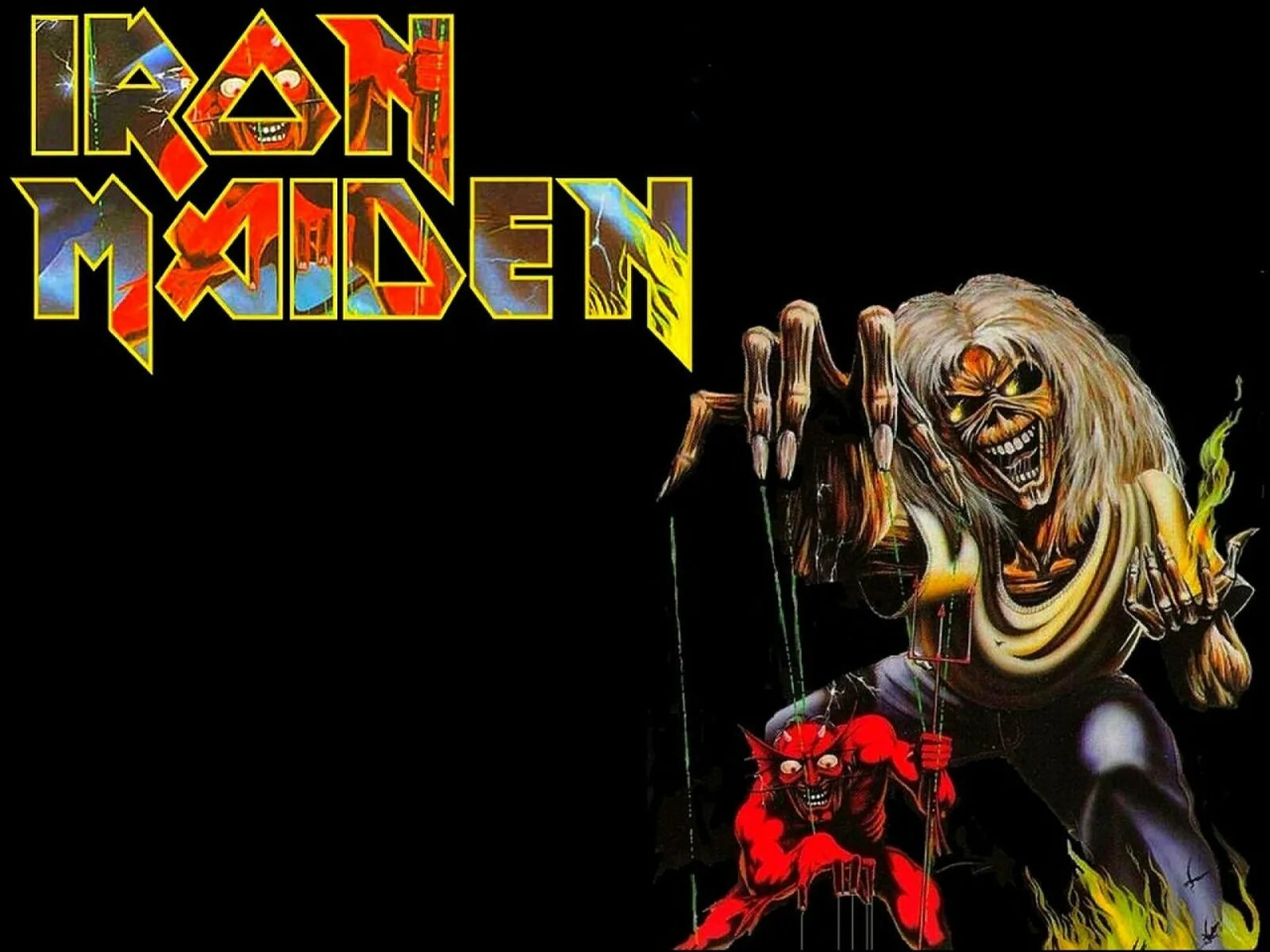 Группа iron maiden обложки. Iron maiden 1975. Айрон мейден фото. Айрон мейден постеры. Рок группа айрон мейден.