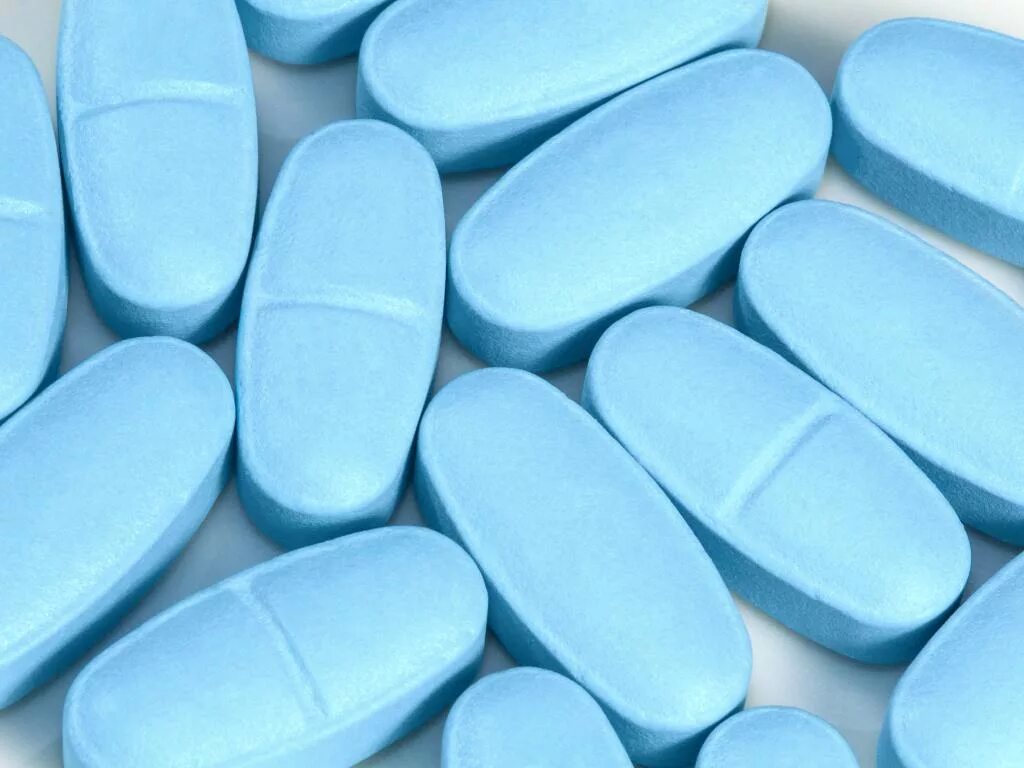 Синие таблетки обезболивающие. Синяя таблетка. Голубые таблетки. Голубые овальные таблетки. Овальные таблетки голубого цвета.