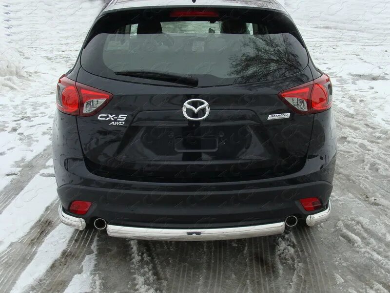 Бампер задний мазда сх5. Защита заднего бампера мазда cx-5. защита бампера mazda cx 5. защита задняя овальная мазда сх-5. защитная дуга задняя мазда сх5.