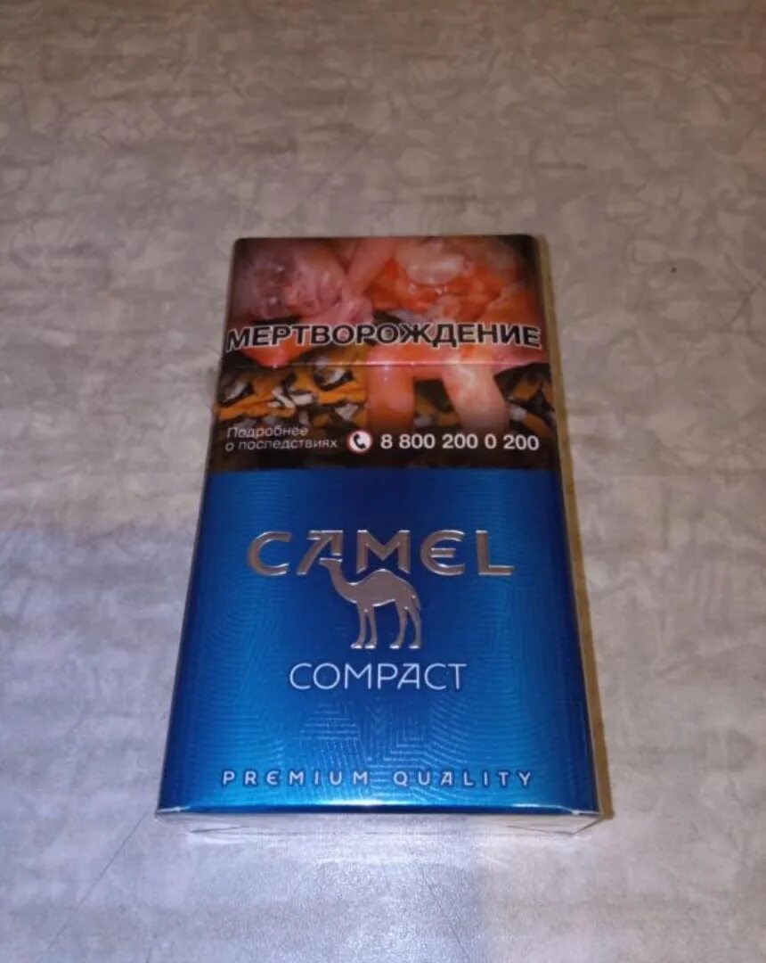 Camel компакт. Camel Compact Blue 100. Сигареты Camel Compact синий. Пачка сигарет кэмел компакт. Компакт КАМЭЛ сигареты кэмел.