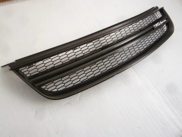 Решетка радиатора trd тойота ист 2002. Решетка esback 661 101 00l. Решетка ист. Бампер scion xa 2006. Решетка радиатора ниссан тиида купить.