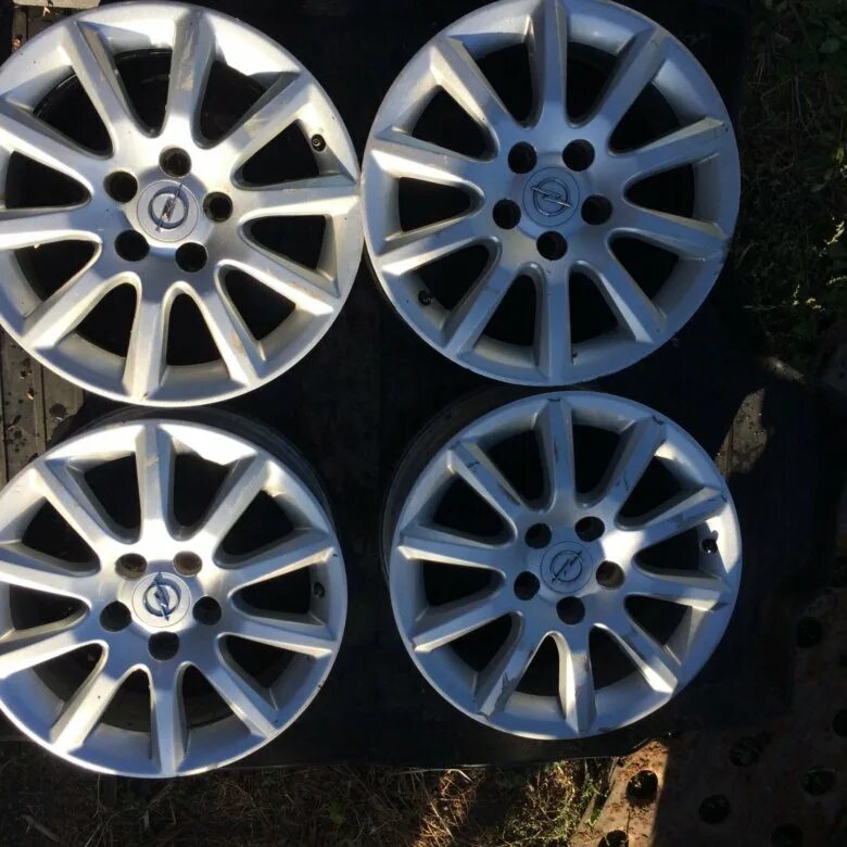 Диски опель оригинал. Оригинальные диски опель астра h. Диски опель оригинал. Opel opc диски r18. Опель корса на 16 дисках.