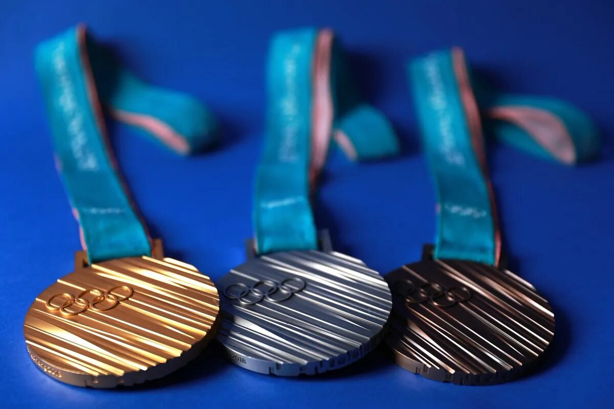Олимпийские медали. Медали олимпиады. Медали ОИ 2018. Олимпийская медаль 2018.