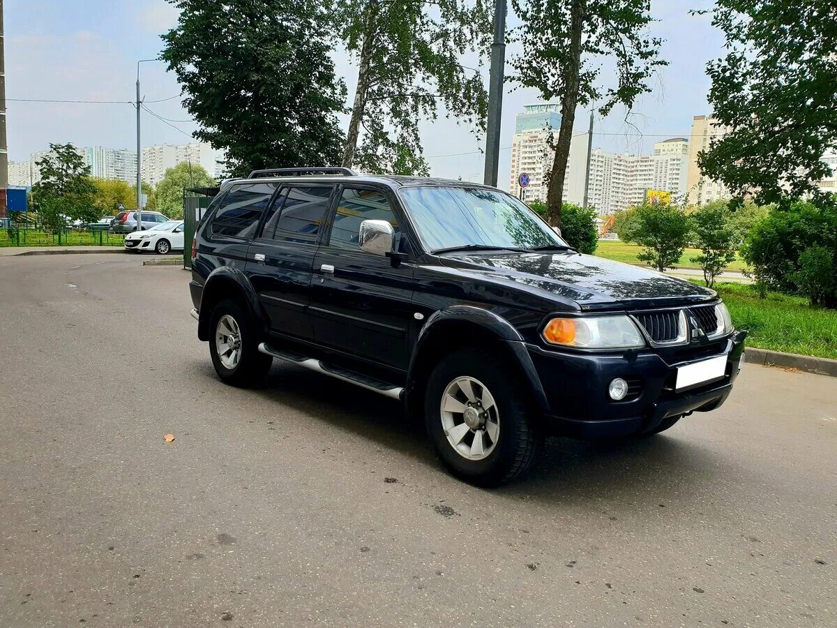 Pajero черный. Mitsubishi Pajero Sport 2007. Митсубиси Паджеро спорт 2008 черная. Mitsubishi Pajero Sport 1 черный. Mitsubishi Pajero Sport черный 2011.