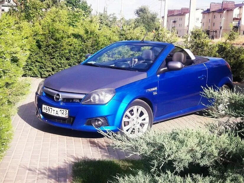 Опель тигра 1995. Opel Tigra арки. Опель тигра 2007. Опель тигра салон