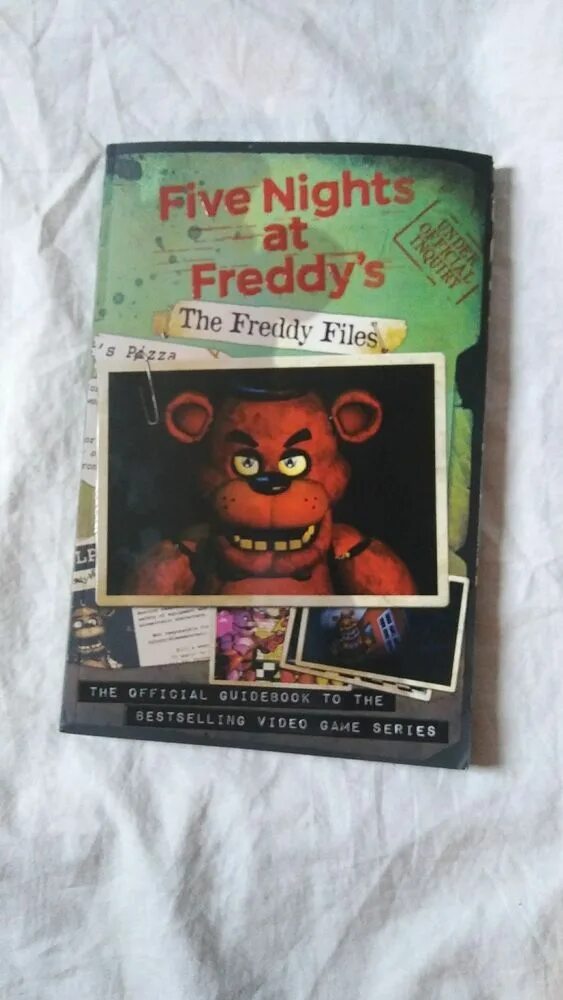 Freddy book. Файлы фредди. файлы фредди обновлённое издание. файлы фредди теории. книги five nights at freddy&#039;s freddy files.