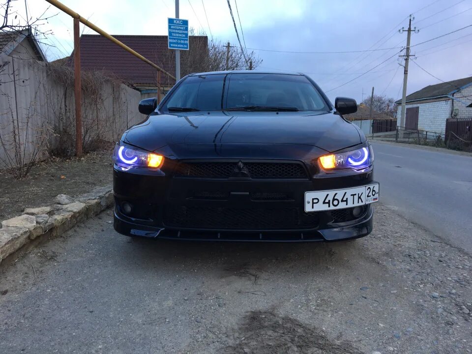 Lancer x ксенон. Ксенон ланцер 10. Vland фары Лансер 10. Ксеноновые фары Митсубиси Лансер 10.