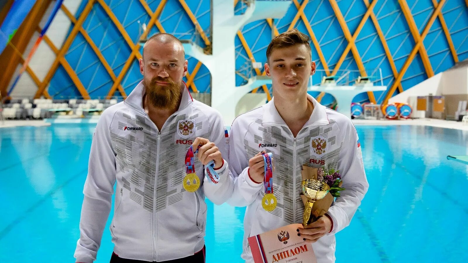 Чемпион мужчины результаты. Кузнецов и Шлейхер прыжки в воду.