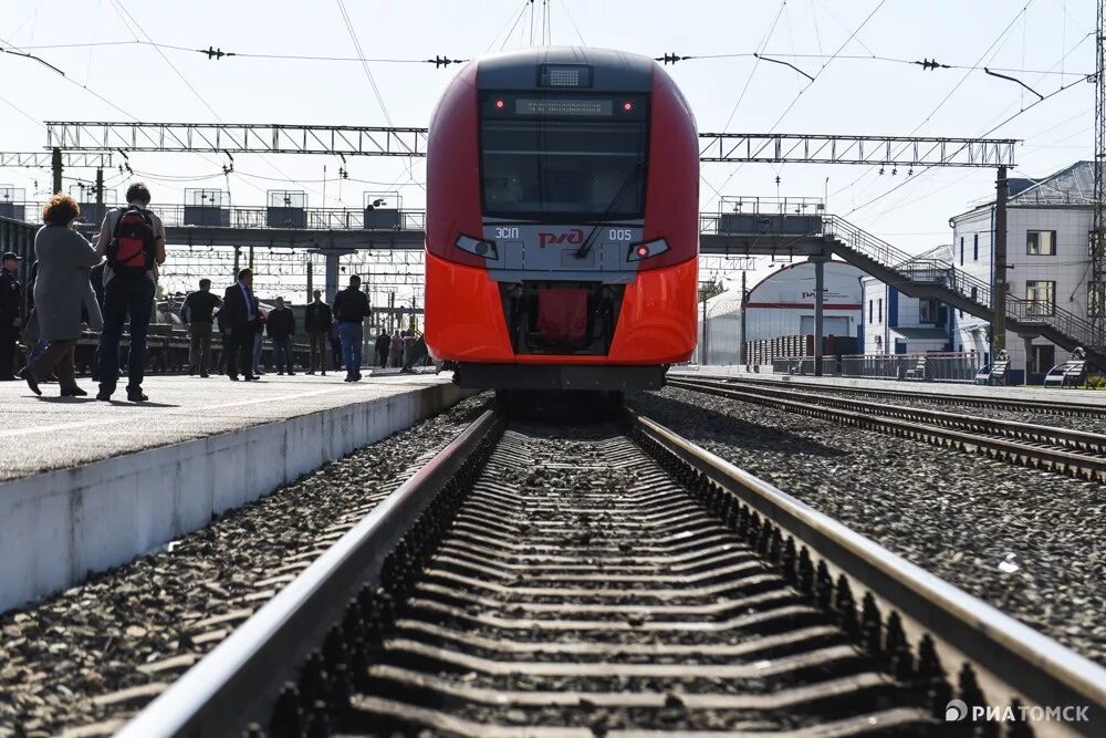 Ржд электричка новосибирск. Электропоезд Новосибирск-Омск Ласточка. РЖД Новосибирск Ласточка. Ласточка Новосибирск Томск. Ласточка Томск поезд.