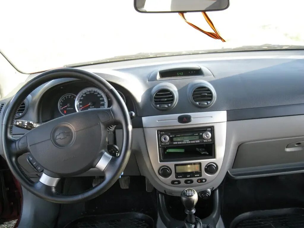 Chevrolet Lacetti 2006 салон. Шевроле Лачетти универсал 2006. Шевроле Лачетти хэтчбек 1.6 автомат салон. Lacetti 2006 хэтчбек салон. Лачетти хэтчбек 2006