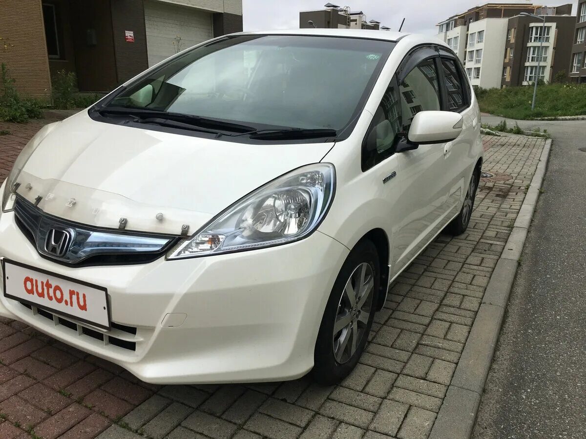 Фит 2012 год. Honda Fit 2012. Honda Fit Hybrid 2012. Хонда фит 2012г. Хонда фит гибрид 2012.