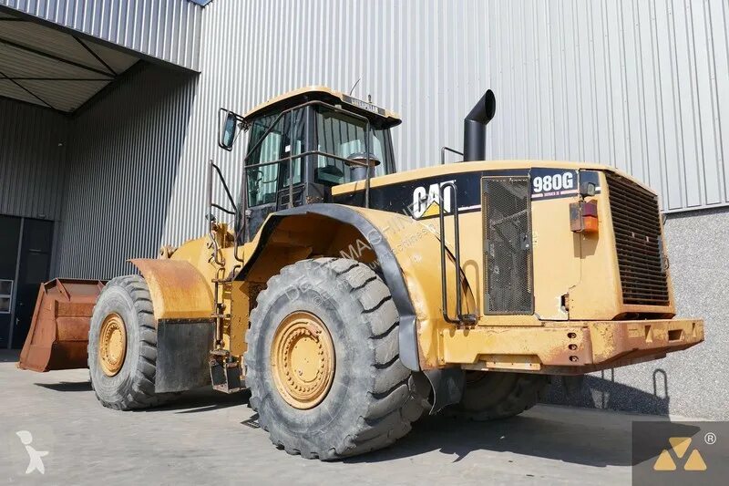 Катерпиллер бу. Caterpillar 980g. катерпиллер 980. сат 980. капот на катерпиллер.
