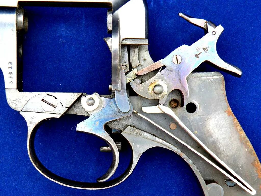 Ударно-спусковой механизм револьвера смит и вессон. Револьвер mauser k50. Наган ударно спусковой механизм. Смит вессон 1874. 44 double action.