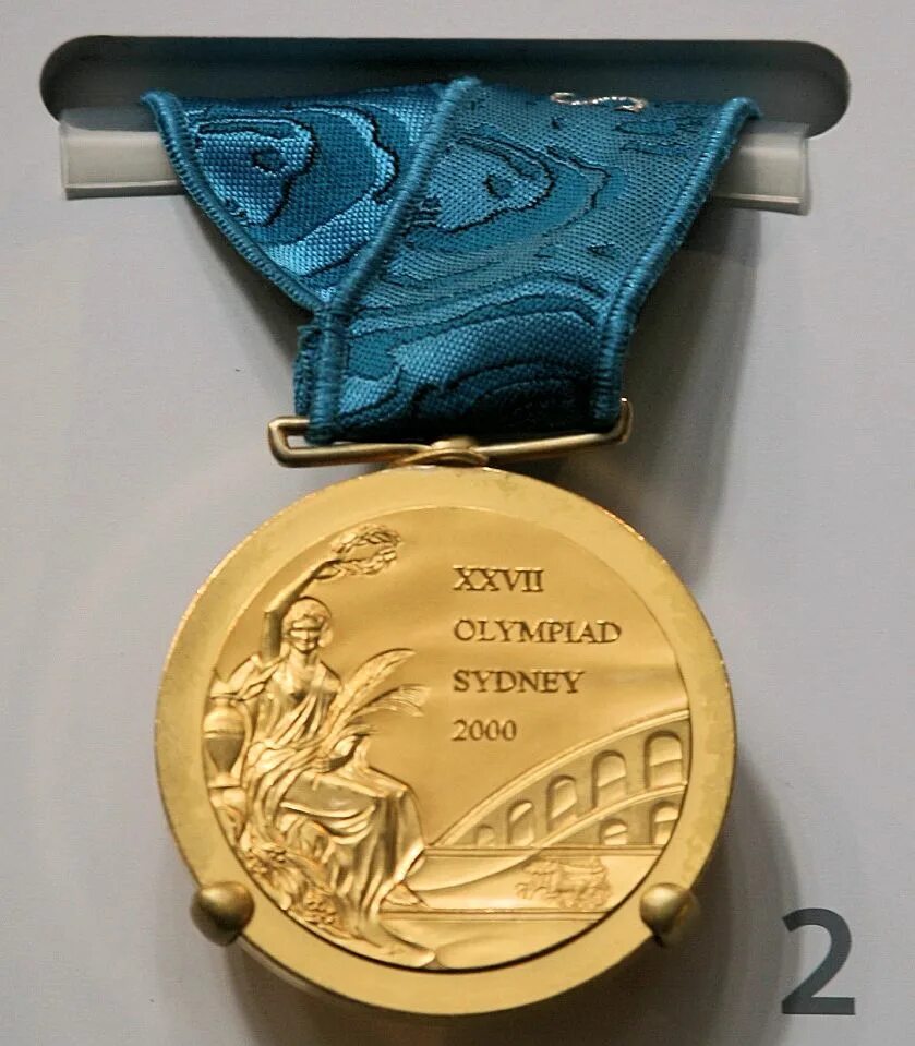 сидней 2000 олимпиада медаль. современные медали. медали олимпийских игр 2000. золотая олимпийская медаль. олимпийская медаль 2000.