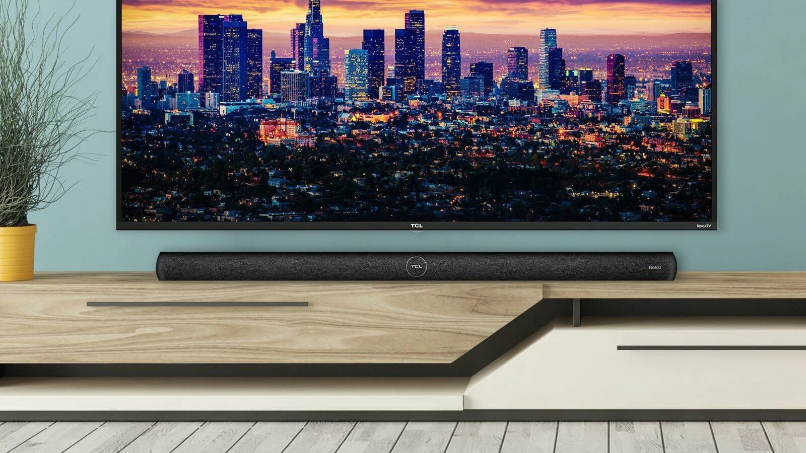 Телевизор звук 1. TCL 55 С саундбаром. TCL 3100 саундбар. TCL телевизор с Soundbar. Roku Smart Soundbar 9100x.