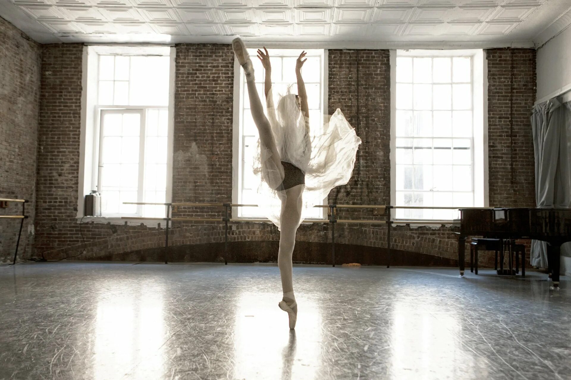 The ballerina are under the shelf