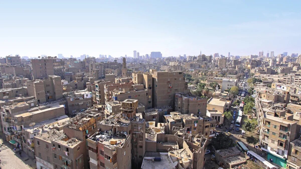 Каир прогноз. Каир трущобы. Район Мадинат Каир. Каир богатые районы. Город мусорщиков в Каире.