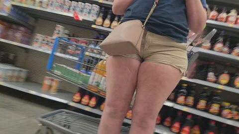 Thick Married BBW PAWG Milf in beige shorts.