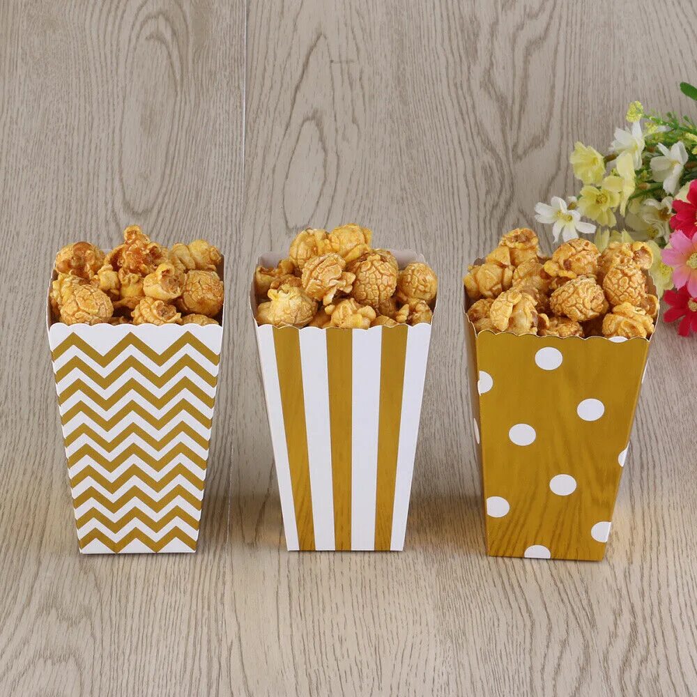 коробочка для попкорна. попкорн в упаковке. попкорн в упаковке. коробочка попкорна. коробочка попкорна.