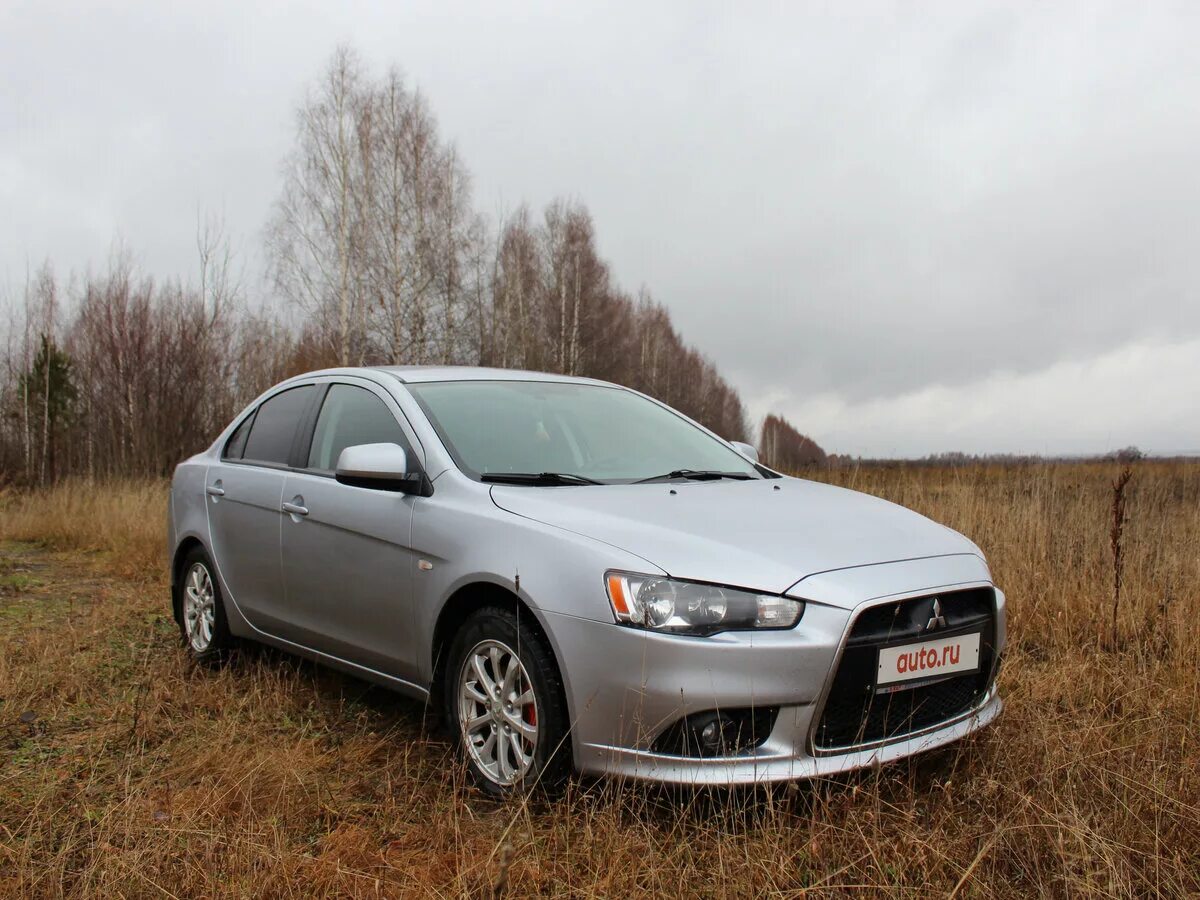 Купить митсубиси в беларуси. Mitsubishi Lancer x 2011. Mitsubishi Lancer x Рестайлинг 2011. Митсубиси Лансер x 2011. Мицубиси ланцер 2011.