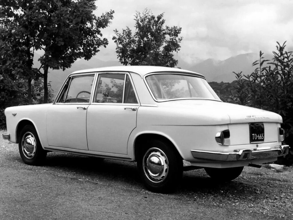 Машина флавия. Автомобиль lancia flavia 1960. лянча флавия 1961. лянча 1960. lancia advertisement 1960.