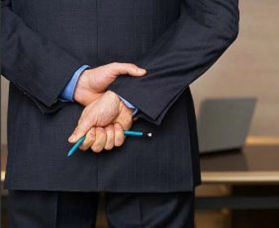 Holding hands behind back. Military man hands behind back. Hands still Clasped behind his back.. Hands Clasped behind their head. Behind hand