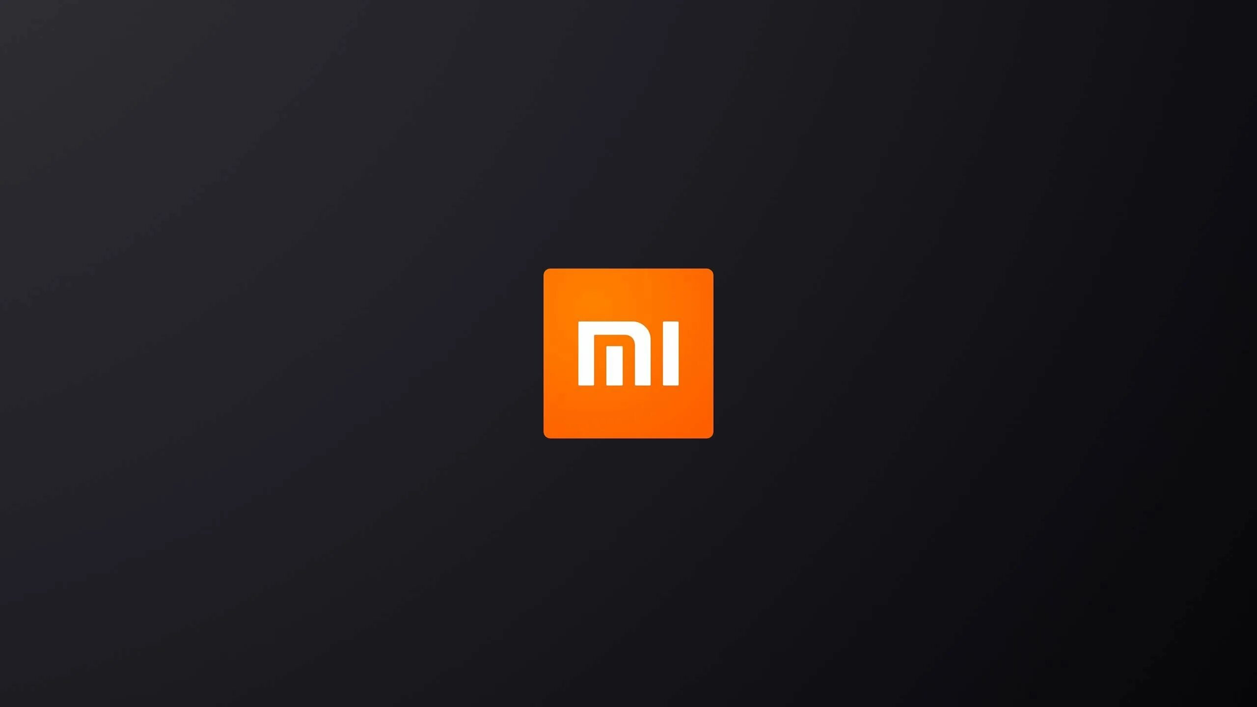 Логотип Xiaomi Redmi. Заставка Xiaomi. Xiaomi на черном фоне. Логотип Xiaomi на черном фоне.