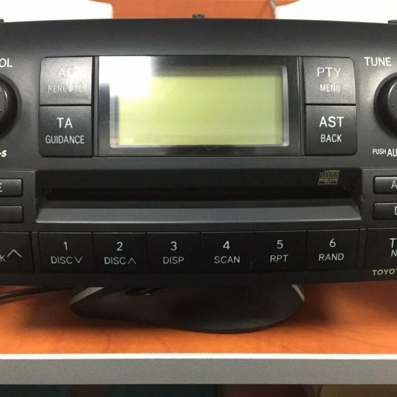 Corolla e150 магнитола mekede dw100s ts7. Королла 2006 магнитола. Магнитола штатная тойота королла 2006. Магнитолы тойота хайлюкс 2014. Королла 150 магнитола родная.