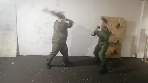 Палкой по голове
