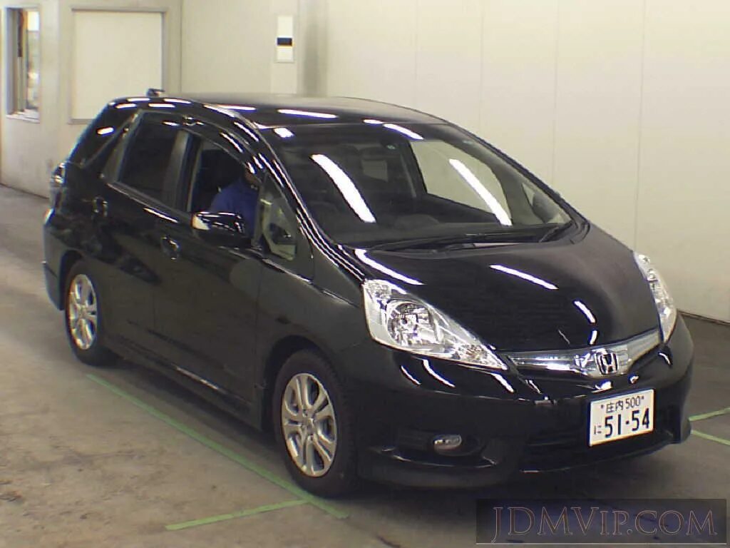 Фит гибрид 2011. Honda Fit 2011 гибрид. Honda Fit Hybrid 2011. Honda Fit Shuttle 2011. Honda Fit Shuttle Hybrid 2011.