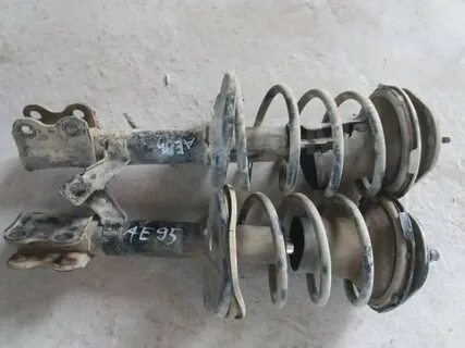 Передние стойки тойота кариб