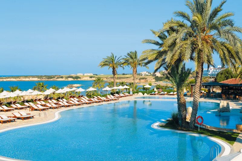 Coral beach hotel resort. Корал Бич отель Пафос Кипр. Кипр Корал Бич 5 Пафос.