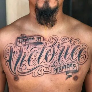 Татуировка Виктория на латинском