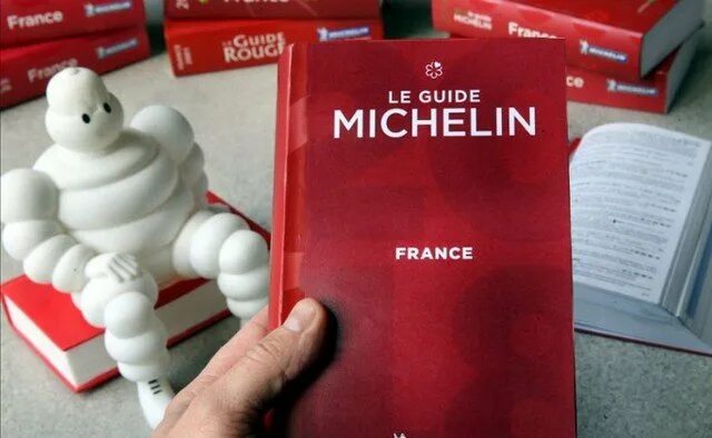 Как получить звезду мишлен. Звезда Мишлен. Гид Мишлен. Красный путеводитель Мишлен. Красный гид Мишлен звезды.
