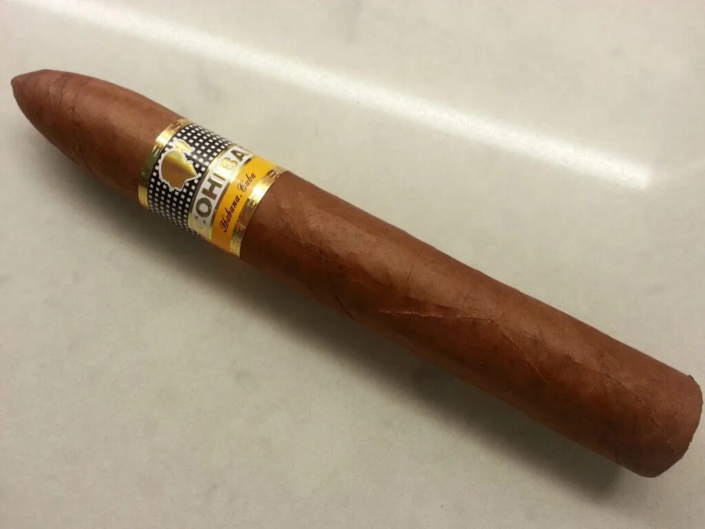 Какие сигары лучше. Сигары cohiba piramides extra. сигара кубинская каиба. 27 кубинских марок сигар. сигары венесуэла.