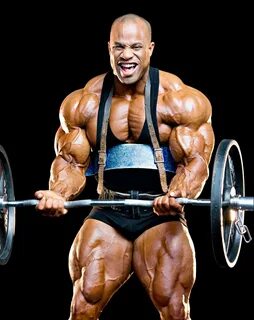 Виктор Мартинес качает бицепс со штангой.